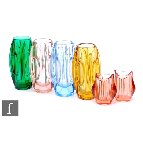 958 - Rudolf Schrotter - Rosice - Four mid 20th Century pressed glass vases each with stepped lens design ... 