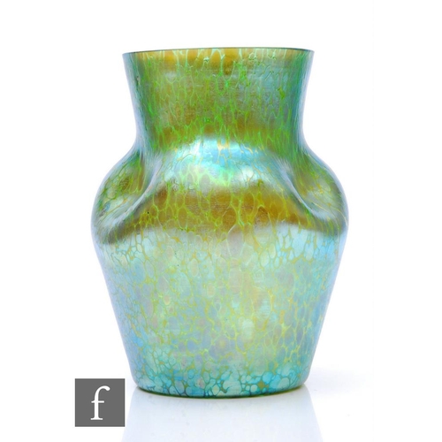 979 - Loetz - An early 20th Century glass vase of low shouldered form with dimpled sides and flared collar... 