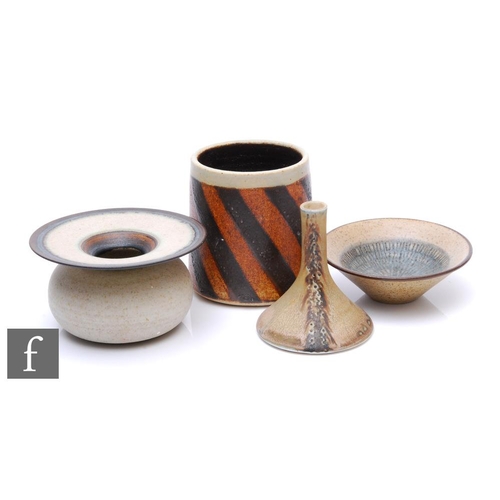 1078 - Emily Myers - Four pieces of studio pottery comprising a compressed beaker vase with painted black a... 