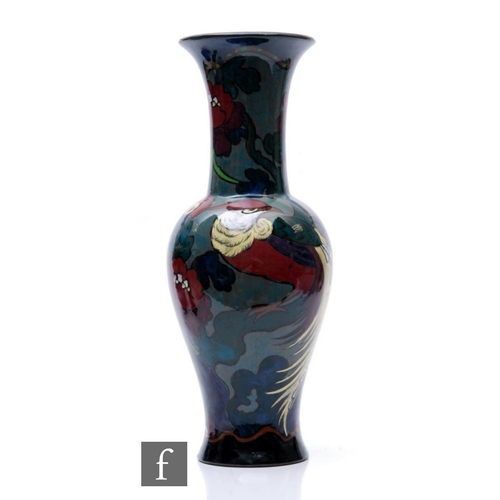 480 - Canning & Co Pottery - An early 20th Century Deco vase of baluster form with tall flared neck, d... 