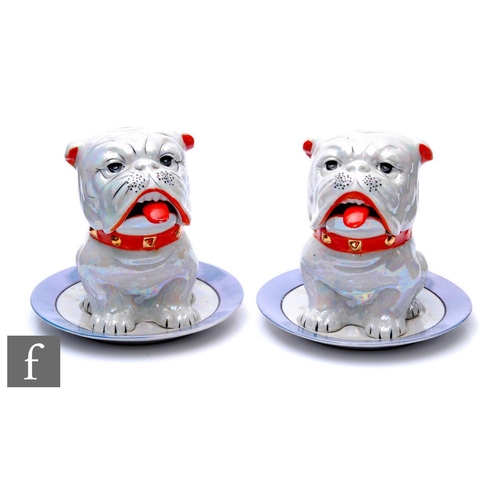 481 - Shofu - A pair of 1920s ceramic preserve pots, modelled as stylised bulldogs, decorated in a lustre ... 