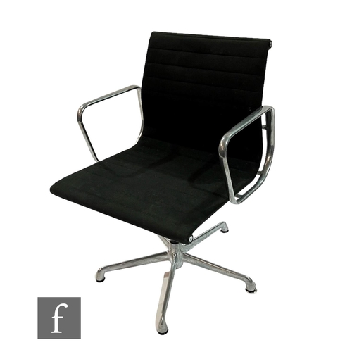 1178 - Charles & Ray Eames - ICF - An EA108 swivel desk chair, with aluminium frame and charcoal grey h... 