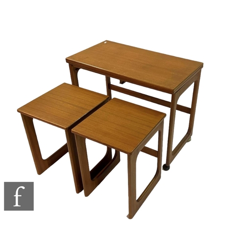 755 - Tom Robertson - A.H. McIntosh & Co Ltd - A nest of teak occasional tables raised to strut loop s... 