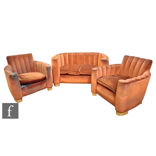 534 - Unknown designer - An Art Deco three-piece lounge suite comprising two seat sofa and a pair of armch... 