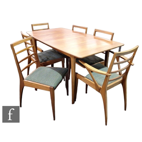 748 - Tom Robertson - McIntosh of Kirkcaldy - A teak Dunvegan dining table and six chairs, the extending t... 