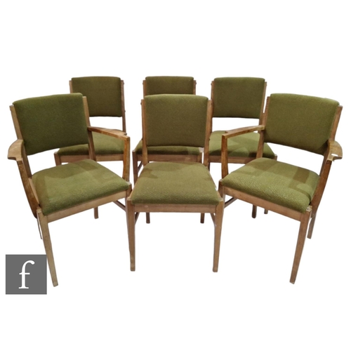 774 - Gordon Russell of Broadway - A set of six dining chairs upholstered in green cloth fabric, to includ... 