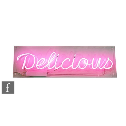 1169 - Unknown designer - A contemporary pink neon sign, 'Delicious', mounted to a clear acrylic panel, hei... 