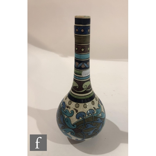 25 - Burmantofts - Leonard King - A Faience Anglo-Persian vase of footed globe and shaft form, decorated ... 