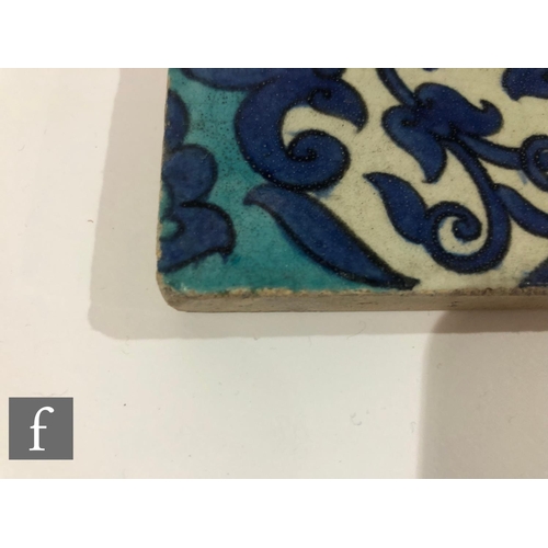 31 - William De Morgan - A Merton Abbey plastic clay tile circa 1885, decorated in the India pattern with... 