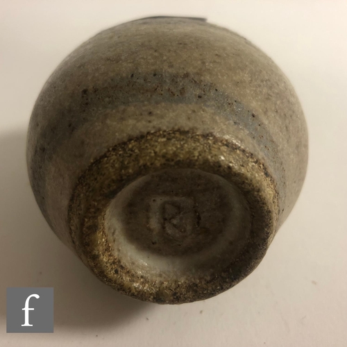 569 - Dame Lucie Rie - A small 'Potato' pot circa 1980, the compressed ovoid form with roll rim and oval a... 