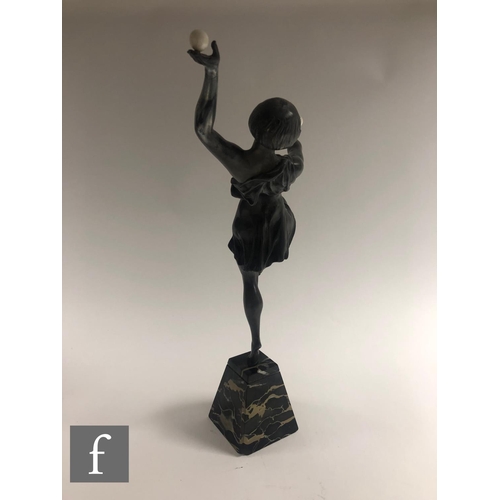 529 - After Marcel Bouraine - A large 1920s patinated bronze figure of a female dancer standing on one leg... 