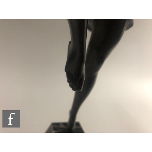 529 - After Marcel Bouraine - A large 1920s patinated bronze figure of a female dancer standing on one leg... 