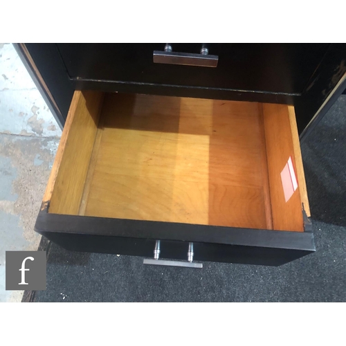 537 - PEL (Practical Equipment Ltd) - A 1930s Art Deco desk, the black laquered frame with twin banks of d... 