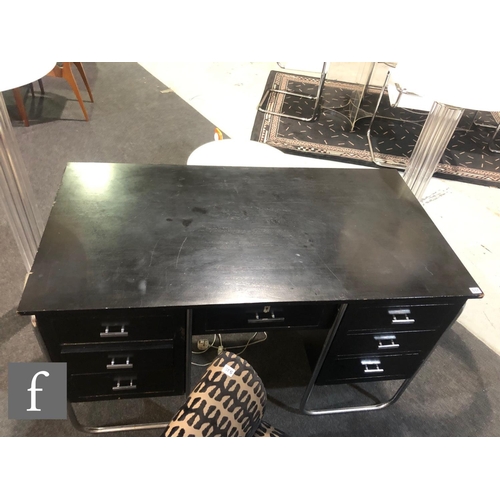 537 - PEL (Practical Equipment Ltd) - A 1930s Art Deco desk, the black laquered frame with twin banks of d... 