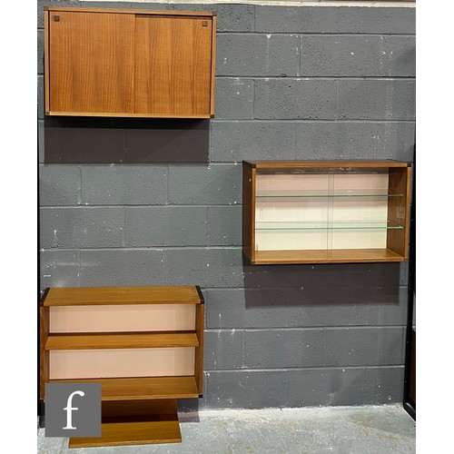 780 - Beaver and Tapley - A group of 'floating' wall-mounted teak modular units to comprise a sliding doub... 