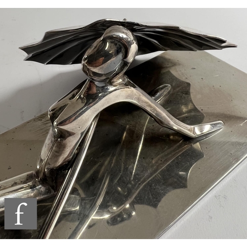 512 - Karl Hagenauer - A 1920s Austrian silvered bronze figure of a stylised female nude sunbathing with a... 