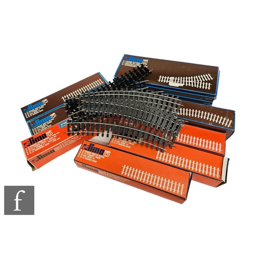 4094 - A collection of OO gauge and O gauge track and scenic accessories, mostly boxed, contained in two bo... 