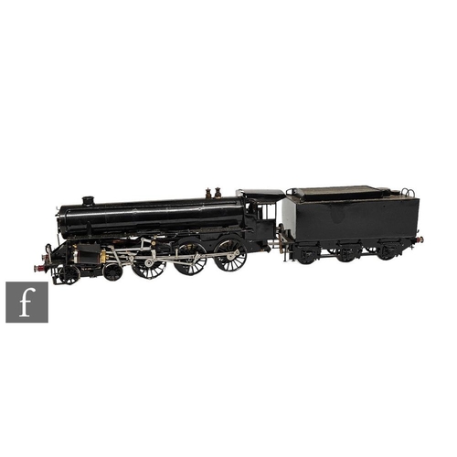 4129 - A kit built 2 inch gauge 4-6-0 locomotive and tender, spirit fired finished in black livery.