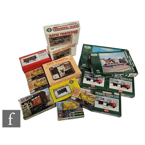 4418 - A collection of railway related plastic model kits, by Peco, Ratio, Airfix and similar.