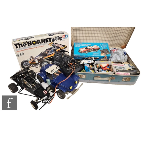 4439 - A collection of assorted toys to include an Ideal Knievel, Schleich Smurfs, radio control cars etc.