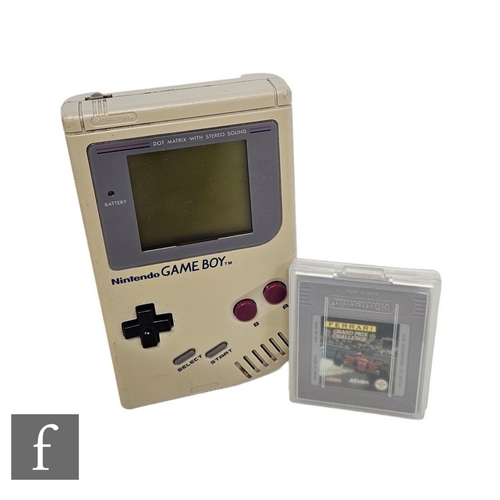 4443 - AMENDED DESCRIPTION - A Nintendo Game Boy, with Ferrari Grand Prix Challenge game. (2)