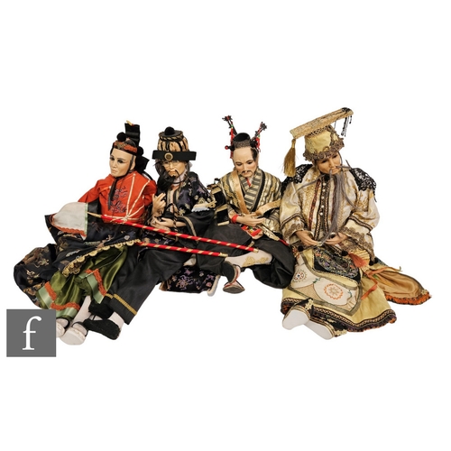 4501 - Four modern collectors dolls, each highly detailed and modelled as a Chinese figure, heads marked JW... 