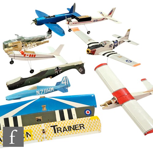 4420 - A collection of balsa wood aircraft, all in need of some repair.