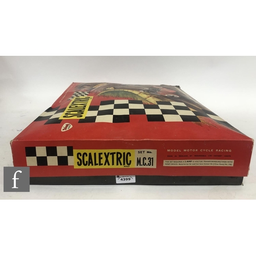 4399 - A Scalextric MC31 Model Motor Cycle Racing set, boxed.