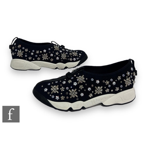 188 - A pair of Christian Dior Fusion slip-on trainers, with crystal embroidered floral decoration over a ... 