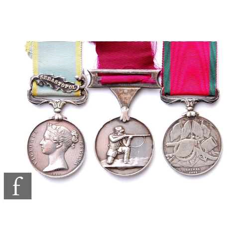 252 - A Crimea medal with Sebastopol bar, a Turkish Crimea medal and a shooting medal, all to 1167 Trumpet... 