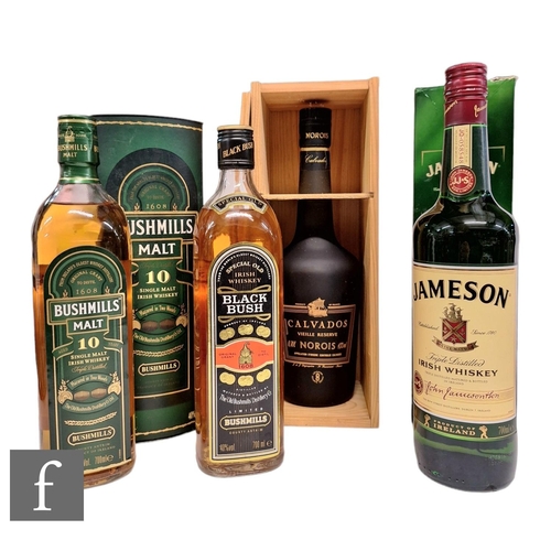 432 - A collection of whisky and cognac, to include a bottle of Jameson, Bushmills Black Bush and Bush Mil... 