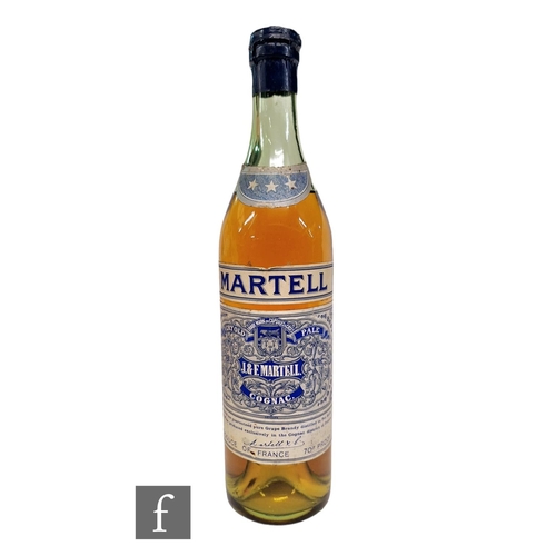 441 - A bottle of Martell VOP 3 stars cognac brandy, with spring cap closed bottling, 1950s/60s bottling.