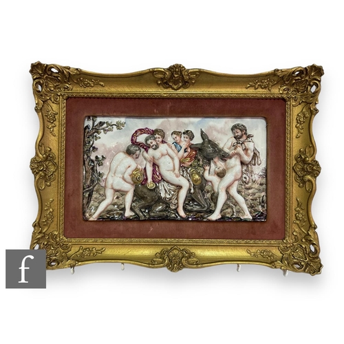 74 - A large 20th Century Capodimonte porcelain plaque relief moulded with an allegorical scene of classi... 