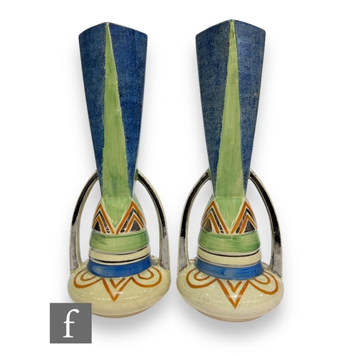 76 - A pair of 1930s Art Deco vases in the manner of Wadeheath, each of low shouldered form with stepped ... 