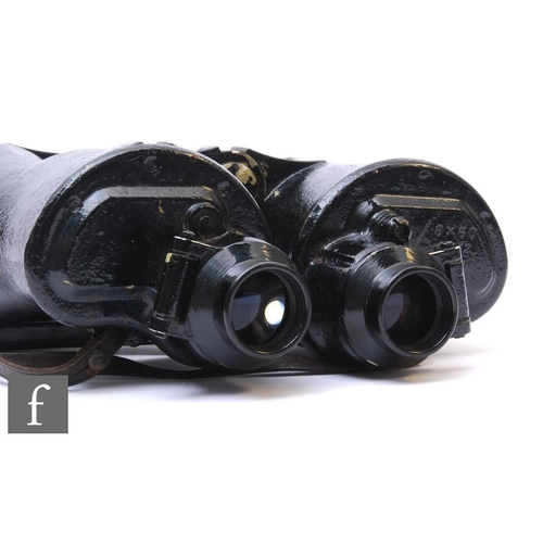 282 - A World War Two U-Boat Commanders pair of BJC binoculars, 8 x 60, serial No 48812, black Bakelite le... 