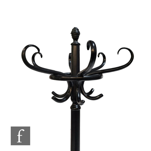 576 - An ebonised bentwood hat stand, height 185cm.