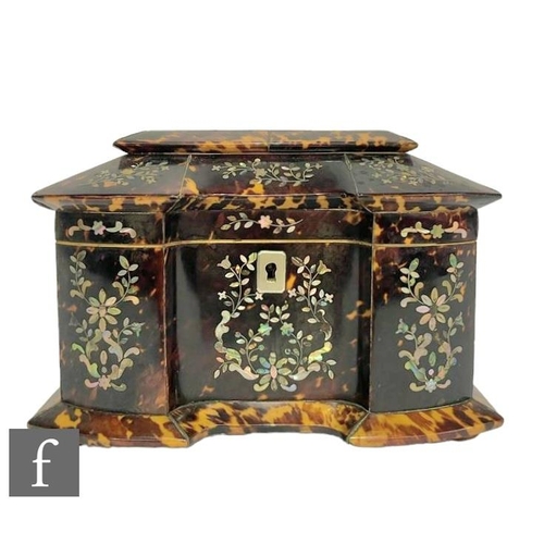 373 - An early 19th Century Regency tortoiseshell tea caddy of inverted breakfront form, inlaid with white... 