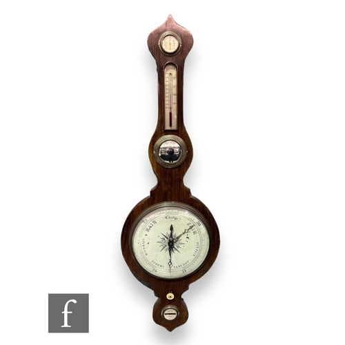 393 - A 19th Century mahogany wheel barometer incorporating DRY/Damp dial, thermometer and level, height 1... 