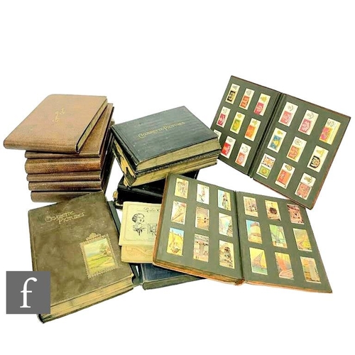 550 - An extensive collection of cigarette cards contained in thirteen albums, Players, Wills and others, ... 