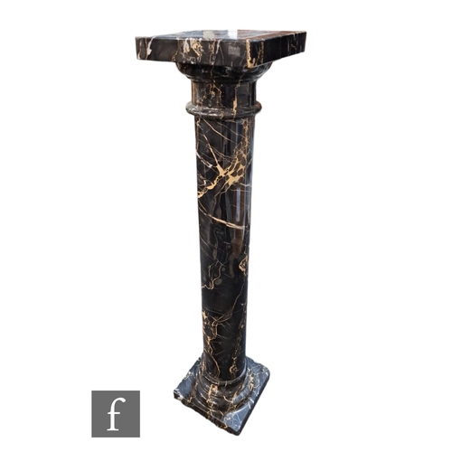 621 - A 20th Century black veined marble pedestal on square plinth base, height 94cm.