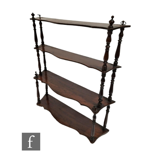 595 - A 19th Century three tier graduated wall hanging what-not, the shape shelves united by turned balust... 