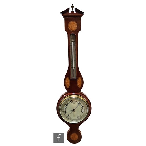 380 - An Edwardian string inlaid and fan paterae decorated aneroid barometer, silver circular dial, cheque... 