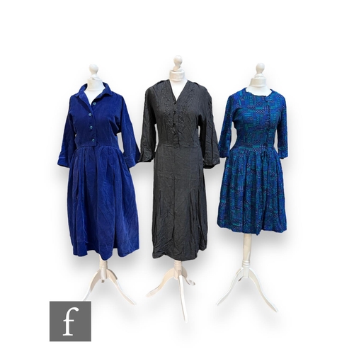 226 - Three lady's vintage dresses comprising a three quarter sleeve cotton midi dress with geometric abst... 