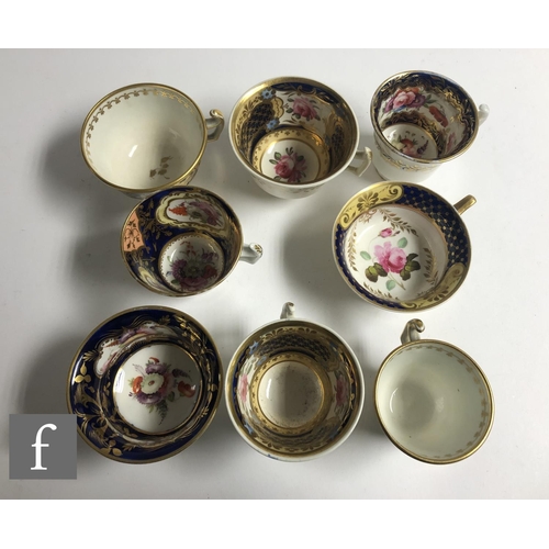 164 - A collection of 19th Century Staffordshire china tea and coffee cups and saucers, all hand enamelled... 