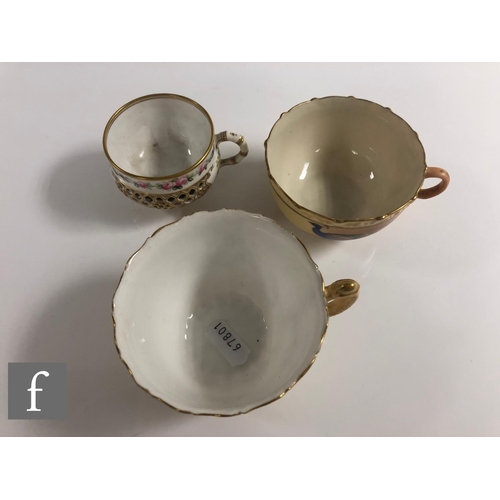 142 - A miniature Worcester reticulated cabinet cup and saucer, the double walled cup with reticulated out... 