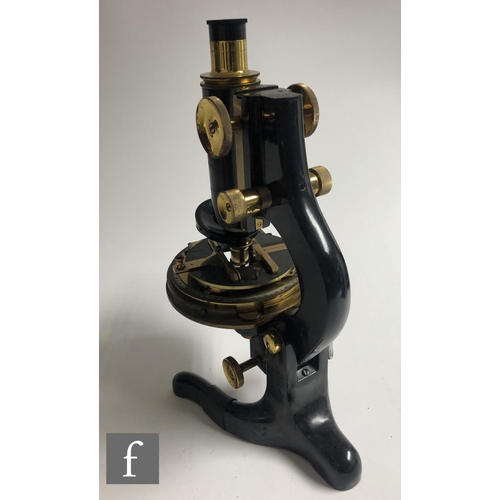 345 - An early 20th Century part brass and black painted microscope by W Watson & Sons London, No 7248... 