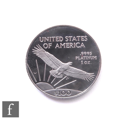 261 - United States of America - A platinum one hundred dollar coin, 1997, Statue of Liberty, eagle in fli... 