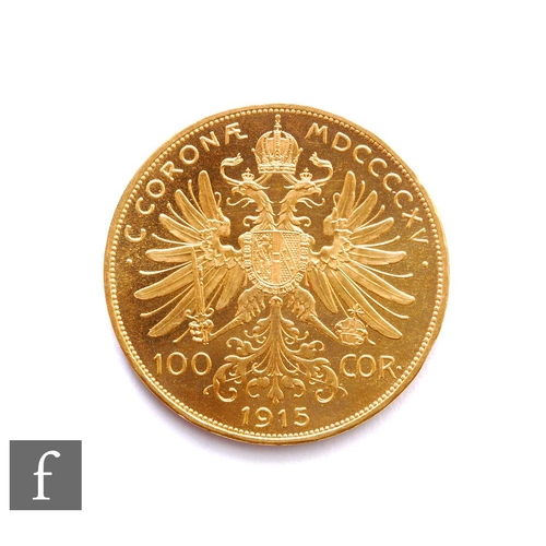 267 - Austria - A one hundred Corona restrike gold coin bearing the date 1915, 33g.