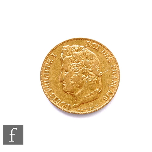 276 - France - A Louis Philippe twenty francs gold coin, 1844, Laureate head, 6.4g.