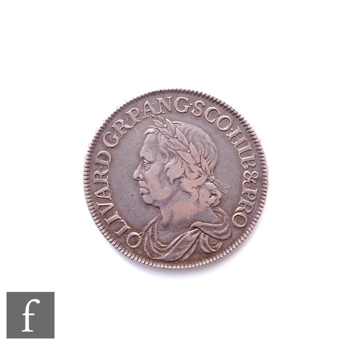 285 - Oliver Cromwell (1653-1658) - A crown, 1658, laureate bust of Cromwell facing left, reverse crowned ... 